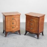 A pair of Edwardian style satinwood and marquetry serpentine beside cabinets,