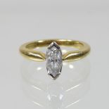 An 18 carat gold marquise cut diamond ring, approximately 0.