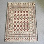 A kelim rug, with all over medallions,