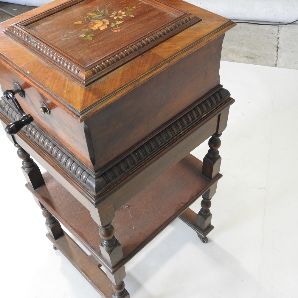 A 19th century German walnut cased wind up symphonion, the painted hinged lid, with a glass inset, - Image 10 of 17