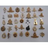 Selection of Various Corps Cap Badges