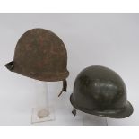 Two American Rear Seam Steel Helmets