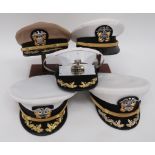 Four US Navy Commander's Caps