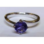 An 18ct white gold and Tanzanite ring (size N)