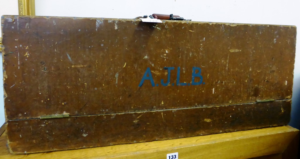 An antique/vintage wooden tool chest.