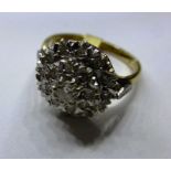 A 9ct gold and diamond cluster ring