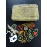 A WWI Princess Mary Christmas tin, together with various girl guide/Boy Scout patches; German Iron
