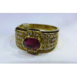 An 18ct yellow gold, ruby and diamond ring (size L)