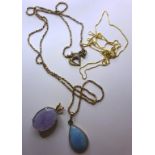 A 14ct gold & opal triplet pendant; a 14ct gold chain; and a 10ct gold chain with two pendants,