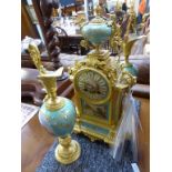 A 19th century French ormolu and porcelain three piece mantel clock garniture, with Japy Freres 8