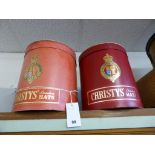 Two vintage 'Christys' London red pillar hat boxes.