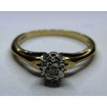 A 9ct gold and diamond ring.