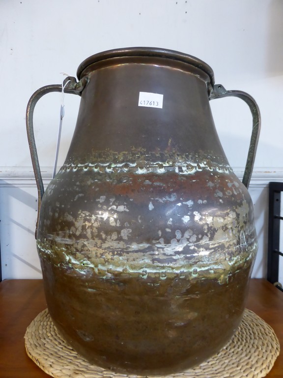 Antique Middle Eastern copper urn.