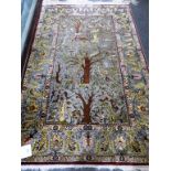 An Indian silk Tree of Life rug.