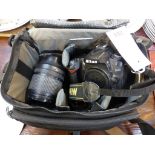 A Nikon D90 digital camera together with a Nikon DX AF-S Nikkor 18-105mm lens and camera bag (3)