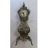 A German novelty silver miniature longcase clock, the clock face marked G. KÜHN, 8cm. high.