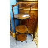 A three tier mahogany cake stand.