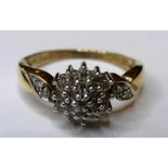 A 9ct gold and diamond cluster ring