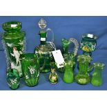 A collection of Victorian and later coloured glass to include jugs, posy vases, and decanters (11)