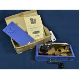 A Thorens Excelda portable gramophone in crackle blue finish C.1930's with original box, spare