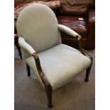 A salon armchair on square tapered legs with pale blue upholstery.