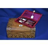 A wooden box for restoration together with a cased sewing etui to include gilt stork scissors (2)