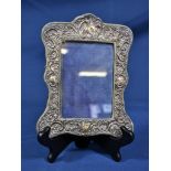 An Art Nouveau silver clad easel photograph frame J & R Griffin, Chester 1906, having all-over