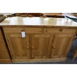 A rustic pine sideboard, two drawers over three cupboards (126cm x 85.5cm high)