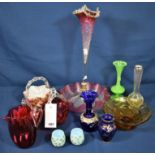 A quantity of various Victorian and later coloured glass to include glass baskets, jug, bowl, posy