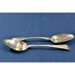Two Channel Islands silver table spoons comprising a fiddle pattern version, maker's mark GH with