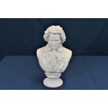 A modern plaster bust of Beethoven made by Condor Holland (sticker to base), 17 3/4in. (45cm.) high.