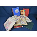 Ten world stamp albums containing mostly used stamps, some early issues (large qty)