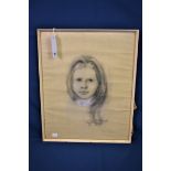 A framed and signed pastel portrait of a young girl, dated '69.