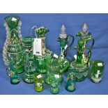A collection of Victorian and later coloured glass to include jugs, posy vases, and decanters (11)