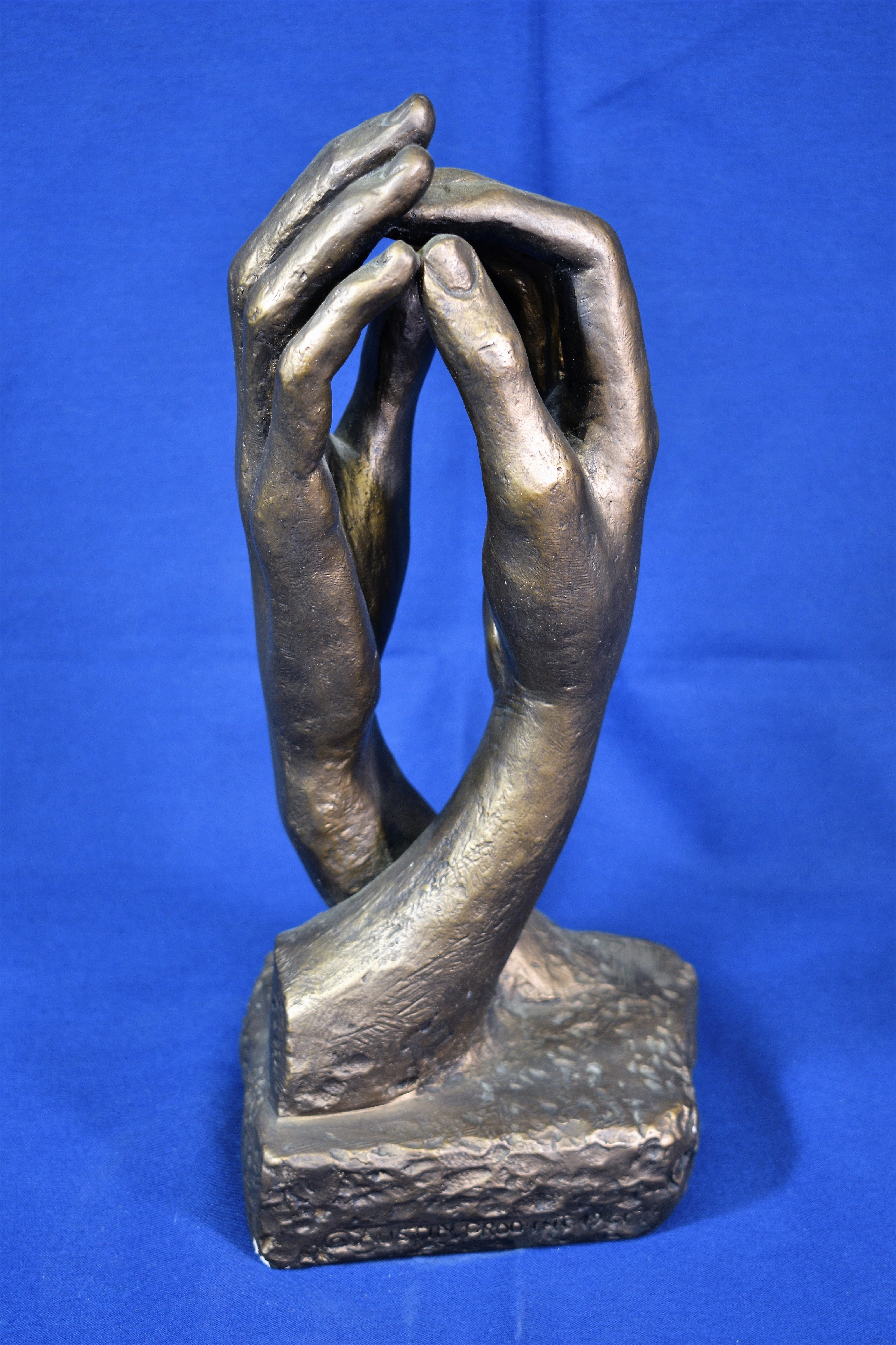 An Austin Products bronzed plaster copy of Rodin's sculpture, 'The Cathedral', impressed mark and