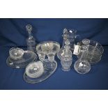 A large quantity of various Edwardian glass to include decanters, glasses, jug, plates and bowls (