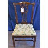 A Chippendale style dining chair, 3rd quarter 18th century, foliate carved yoke back over an
