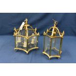Two matched brass framed hexagonal hall ceiling lanterns large lantern 36cm width, smaller lantern