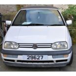A 1996 Volkswagen Golf Avant Garde Cabriolet candy white, 2.0 litre, manual, electric roof, four