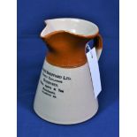 An Alfred Sheppard Ltd. Guernsey Wine, Spirit & Tea Merchants stoneware jug.