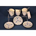A set of six Royal Copenhagen cups and saucers painted in underglaze blue in 'Onion' pattern,