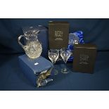 A quantity of boxed Royal Scot Crystal comprising three decanters, two jugs and six glasses (11)
