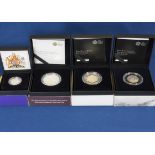 Coinage - A collection of cased commemorative silver proof coins comprising of 'The 100th