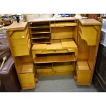 A mid 20th century teak Magic Box desk (83cm x 54 cm x 113cm when closed)