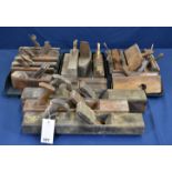 A large collection of various woodworking planes to include moulding planes etc. (large qty)