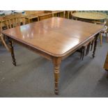A William IV mahogany pull-out extending mahogany dining table the moulded rectangular top with