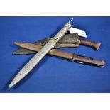 Two German K98 bayonets, the first stamped Elite-Diamant 2669 f to blade but ffc 1940 to scabbard,