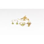 A suite of 9ct gold and peridot jewellery comprising a ring, a pair of drop earrings and a pendant