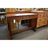 A William IV mahogany side table the rectangular top with three quarter gallery, over two raised