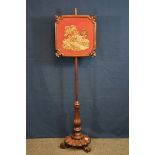 A William IV tapestry pole screen depicting hunting scene, gadrooned baluster column and base,